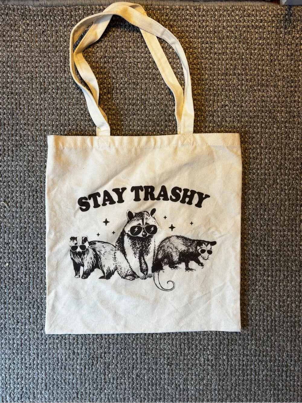 White Canvas Tote Bag with 'Stay Trashy' Raccoon Graphic